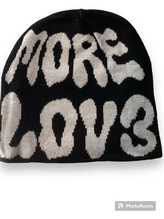 Black beanie with white and reversible with grey font